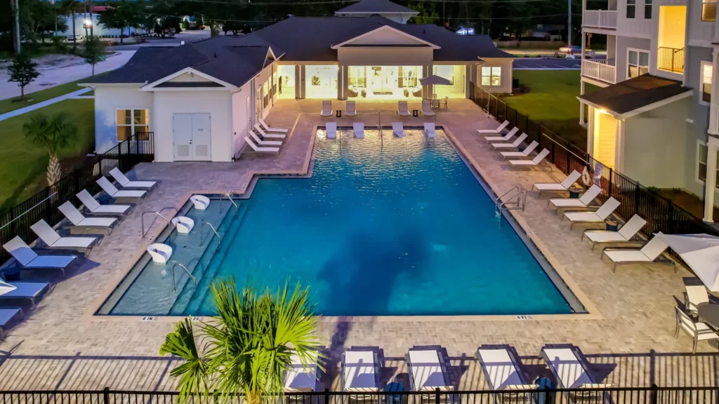 Pool and clubhouse at the Exchange at Orange Park, a multifamily garden apartment complex in Jacksonville, Florida.